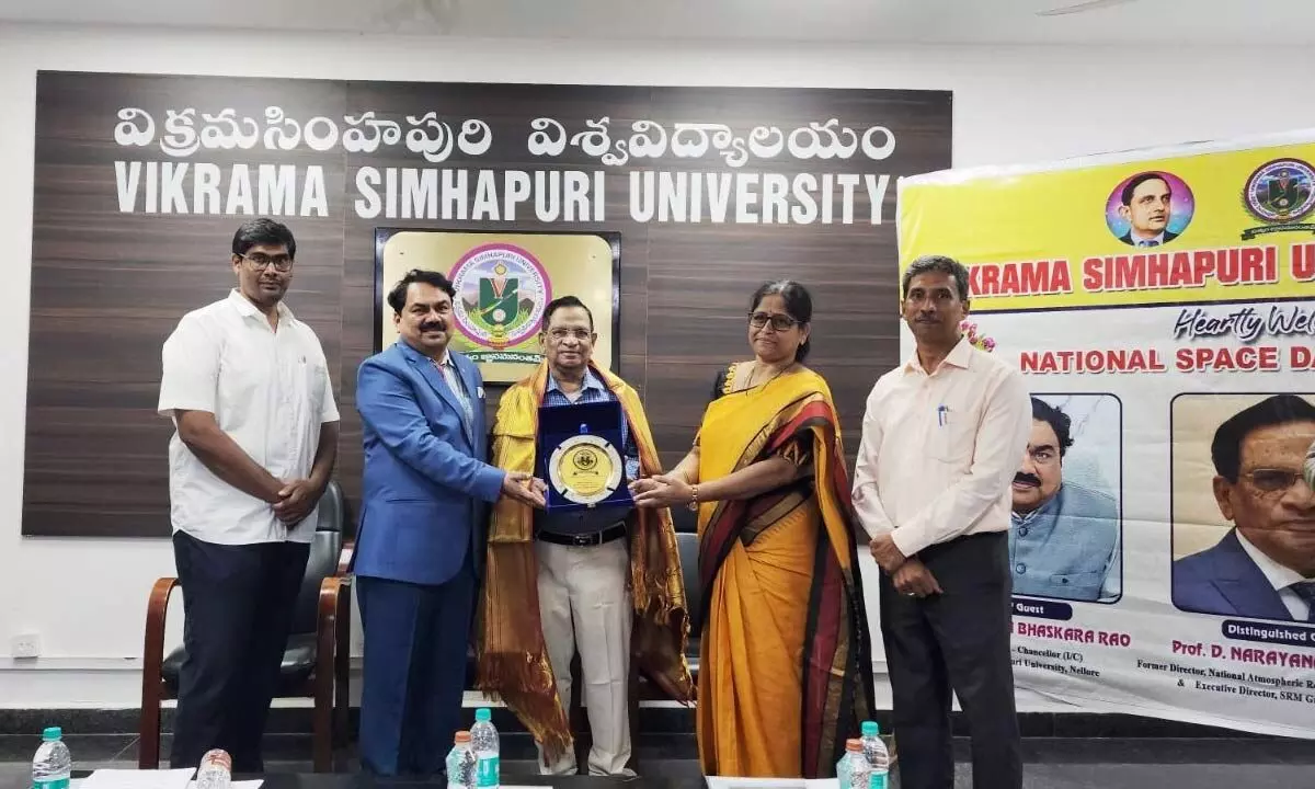 VSU Vice-Chancellor S Vijaya Bhaskar Rao felicitating NARL former Director D Narayana Rao on National Space Day in Nellore on Friday