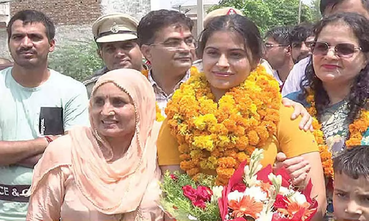 Manu accorded warm welcome at her village