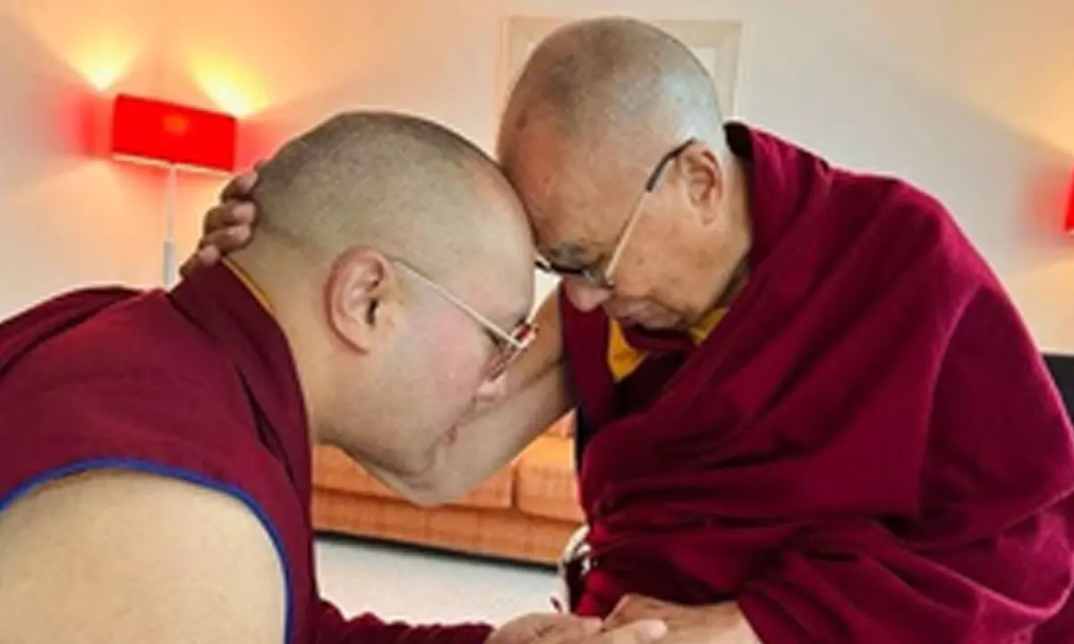 Tibetan religious head Karmapa calls on Dalai Lama after seven years