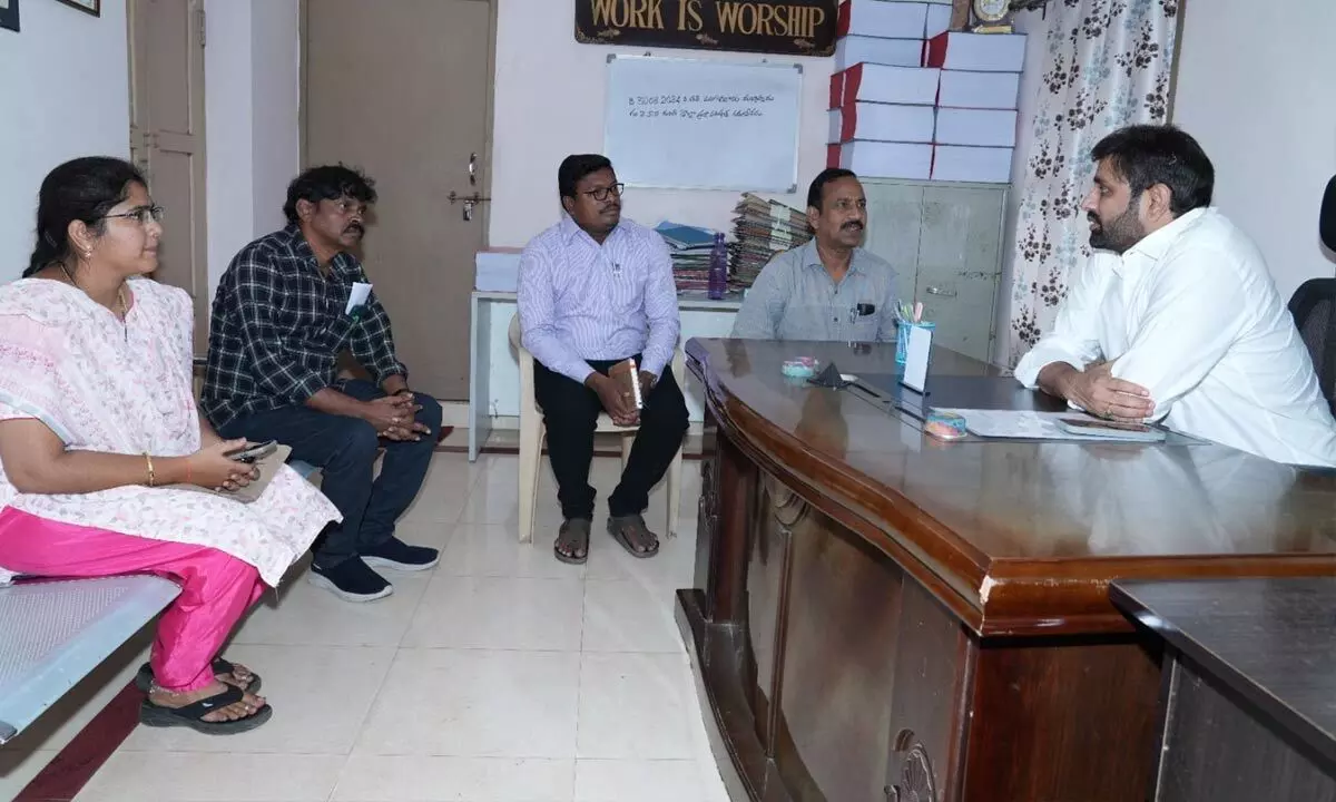 MP Putta Mahesh Kumar holding a review meeting with officials in Eluru on Monday