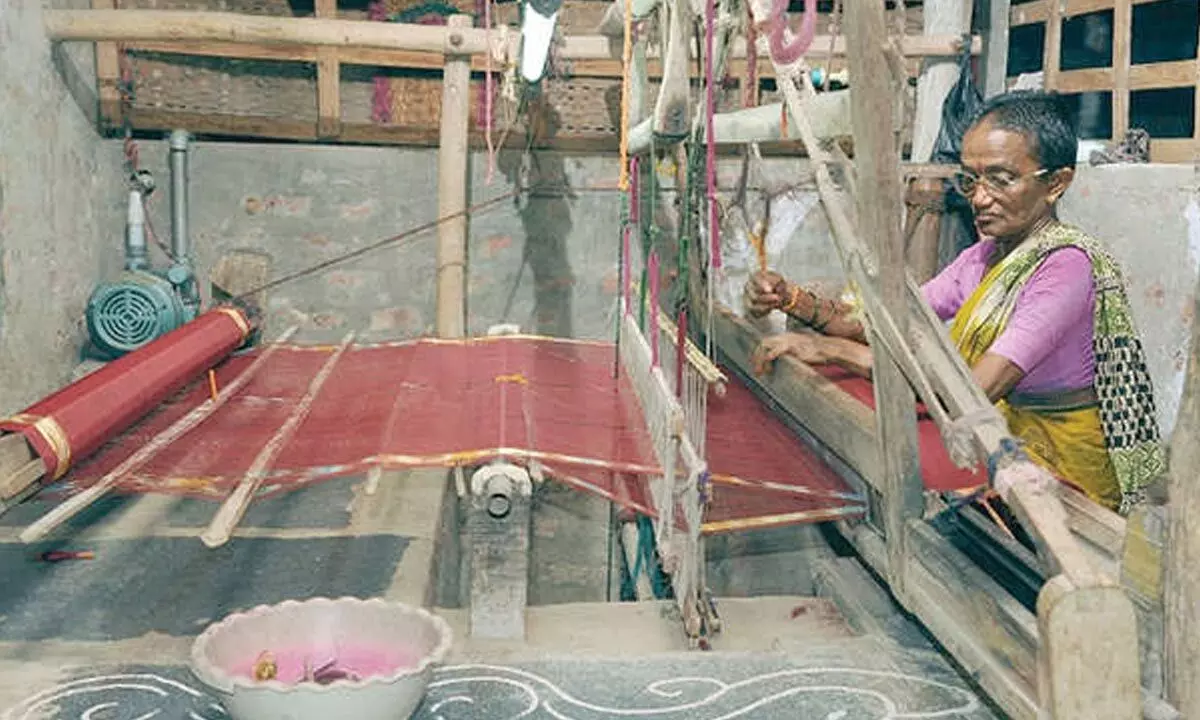 A handloom worker weaving a saree                                                              - File Photo