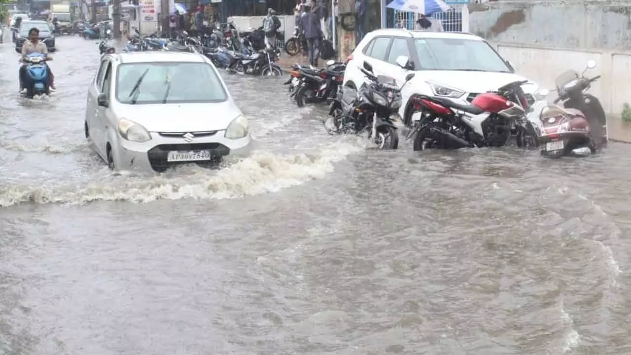 Roads under sheets of water due to heavy rain in Srikakulam on Thursday