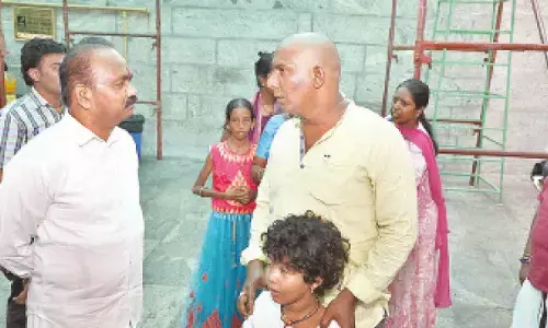 TTD EO J Syamala Rao interacting with a devotee at Tiruchanoor Ammavari temple on Thursday