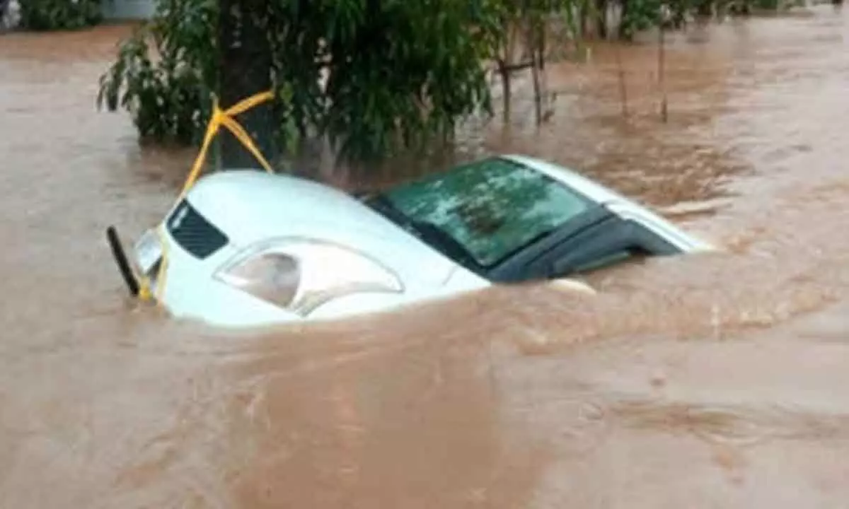 Three dead after car washes away in flood water in Guntur