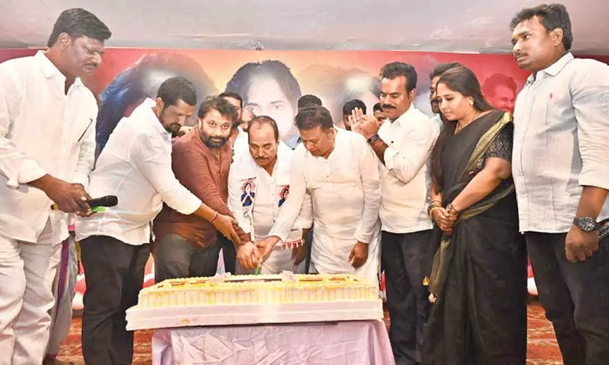 Tirupati MLA Arani Srinivasulu along with party leaders P Hariprasad and Kiran Royal cutting a cake ahead of Deputy CM Pawan Kalyan’s birthday celebrations in Tirupati on Sunday