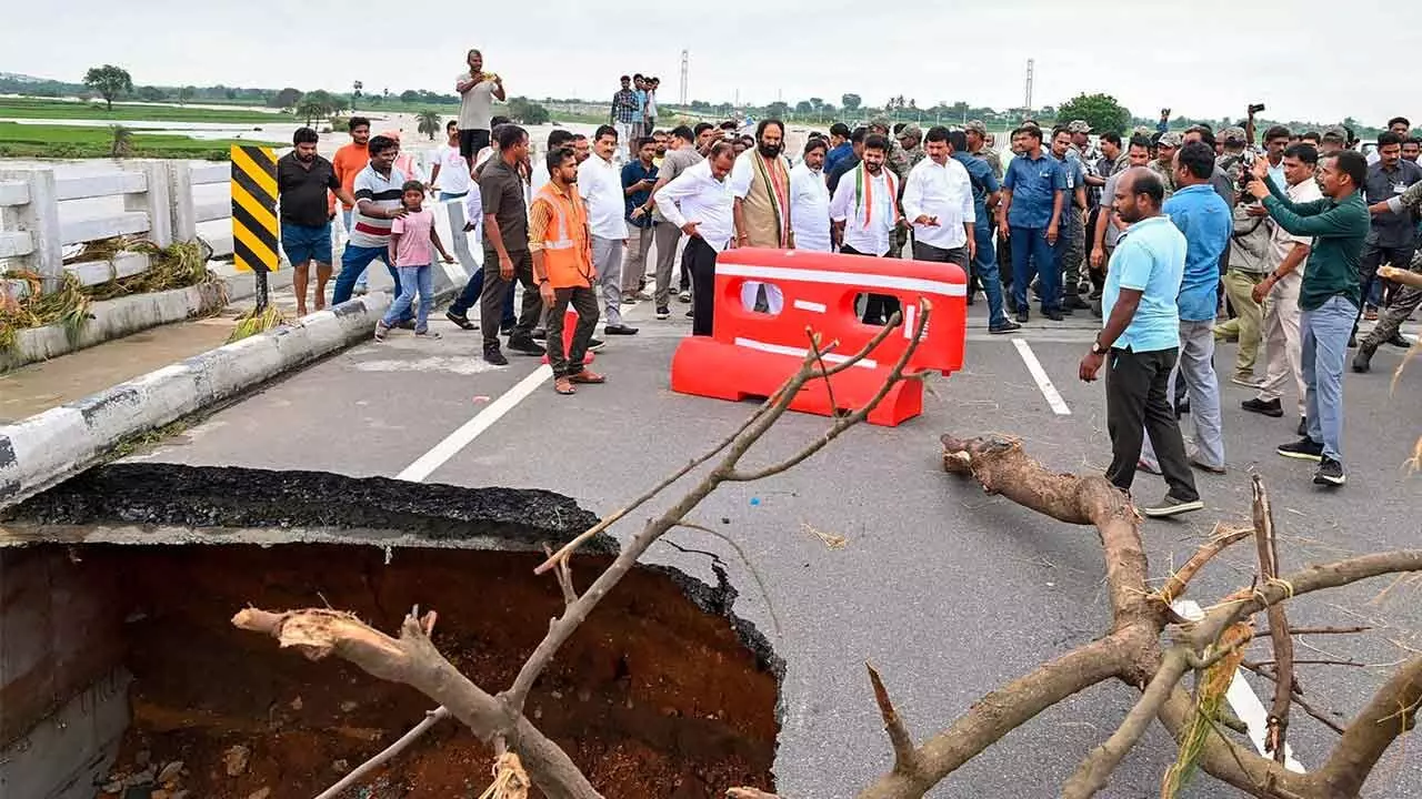 CM Revanth Reddy, Deputy CM Bhatti Vikramarka and Minister Ponguleti inspect a damaged road near Khammam on Monday