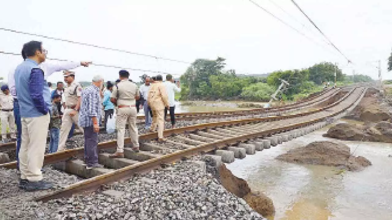 Heavy downpour disrupts train services