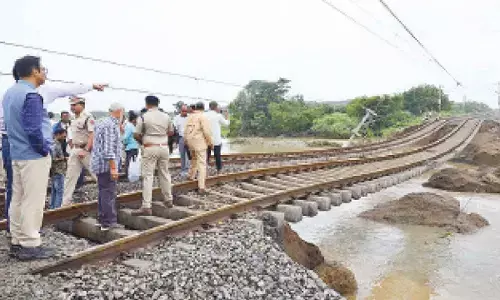 Heavy downpour disrupts train services