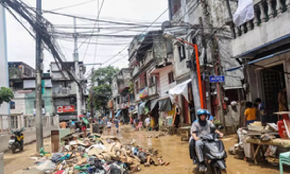 Death toll from Philippine floods, landslides rises to 15, with 21 missing