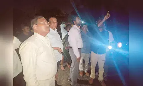 APTransco staff restoring power in flood-hit areas in Vijayawada on Tuesday