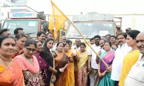 MLA Damacharla Janardhana Rao flagging of relief lorries from TDP office in Ongole to Vijayawada on Tuesday