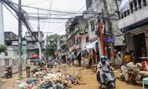 Death toll from Philippine floods, landslides rises to 15, with 21 missing
