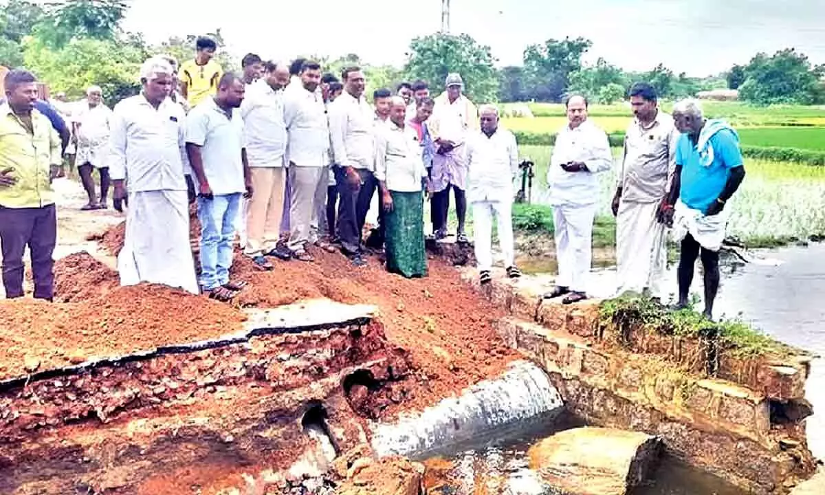 MLA Bandla Krishna Mohan inspects damaged culvert