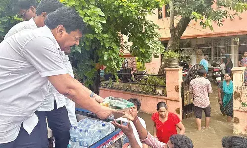 Minister Durgesh visits flood areas in Vijayawada