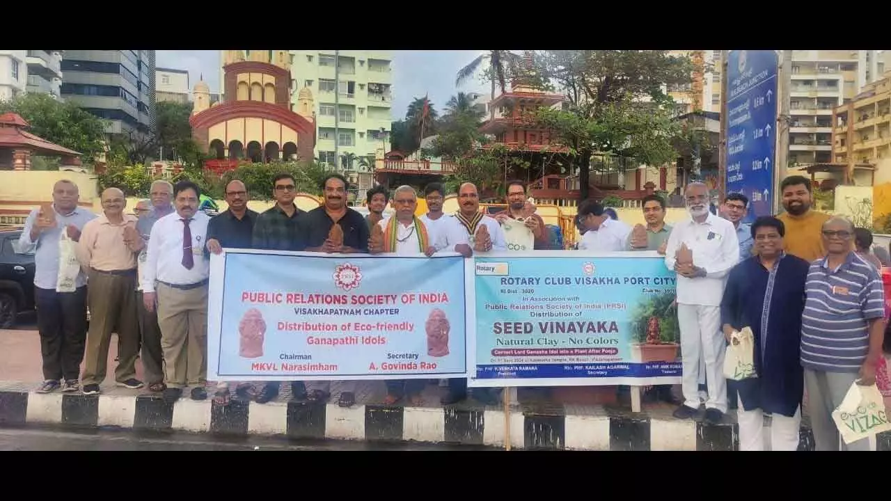 PRSI and Rotary Club Port City distributing clay idols at RK Beach in Visakhapatnam on Thursday.