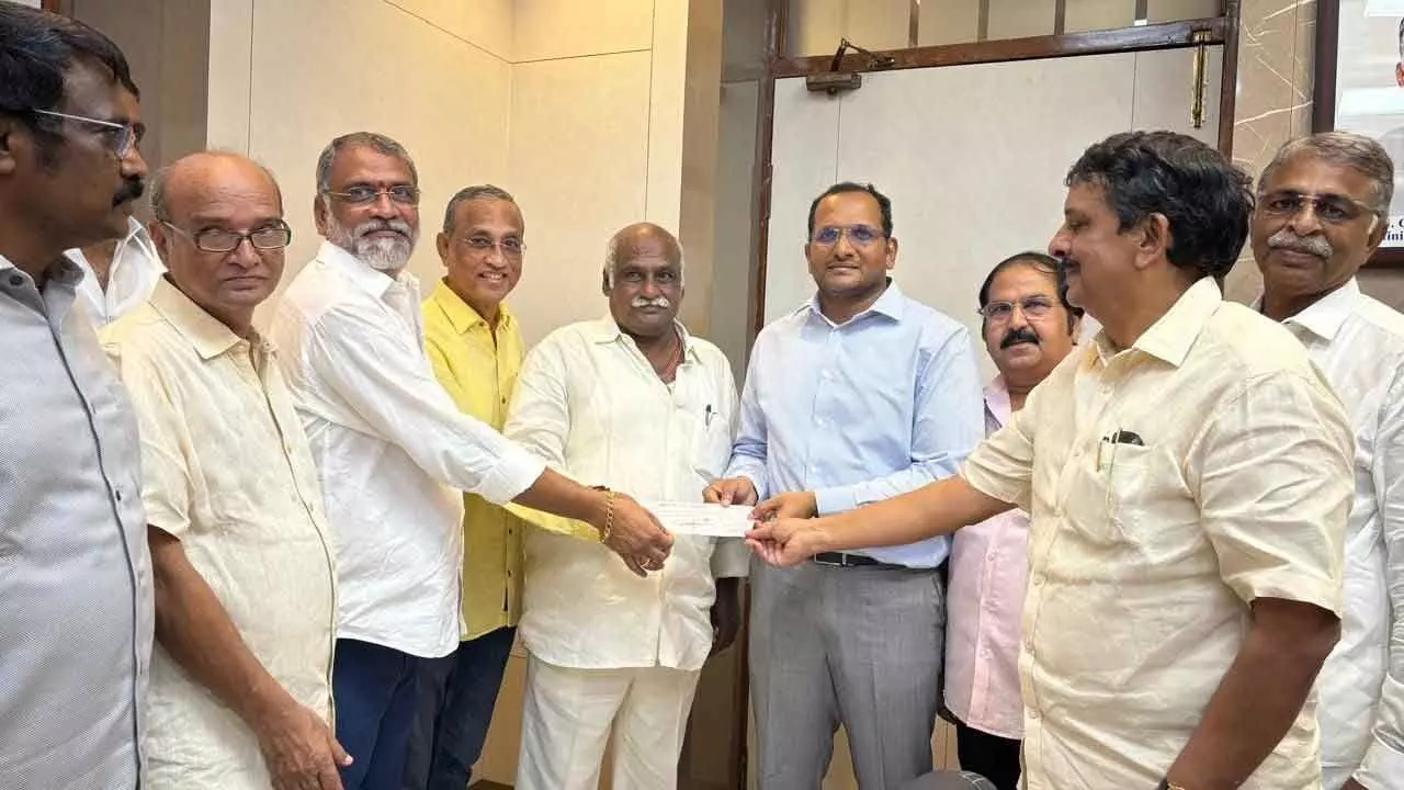 IBP Century Club donating a cheque for Rs 10,00,116 to the Andhra Pradesh Chief Minister’s Relief Fund to District Collector MN Harendhira Prasad in the presence of MLA V Ramakrishna Babu in Visakhapatnam on Thursday.