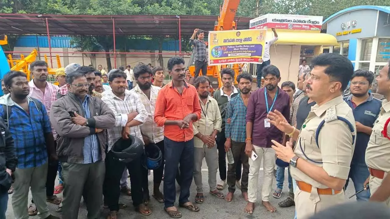 Tirumala DSP Vijay Shekar at an helmet awareness programme on Thursday