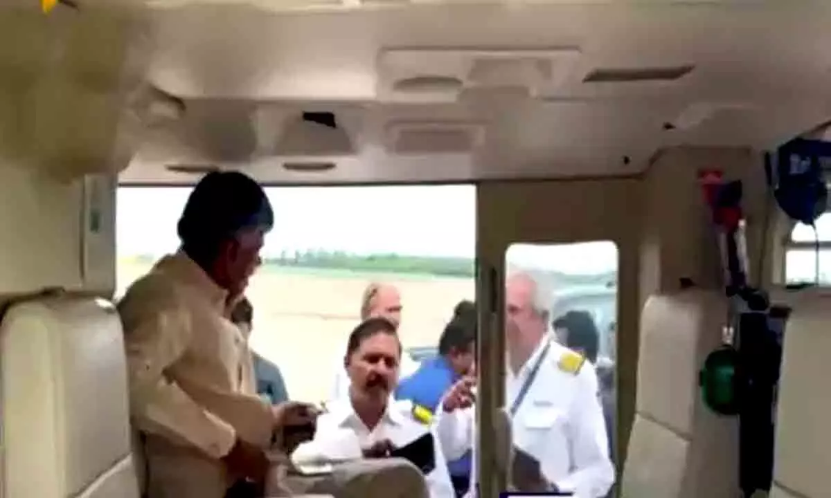 Chandrababu Naidu Conducts Aerial Survey of Flood-Prone Areas in Vijayawada