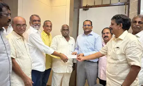 IBP Century Club donating a cheque for Rs 10,00,116 to the Andhra Pradesh Chief Minister’s Relief Fund to District Collector MN Harendhira Prasad in the presence of MLA V Ramakrishna Babu in Visakhapatnam on Thursday.