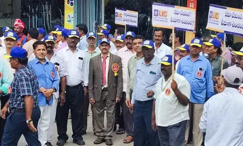 LIC employees and others taking out a rally in Kadapa on Thursday