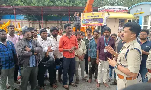 Tirumala DSP Vijay Shekar at an helmet awareness programme on Thursday