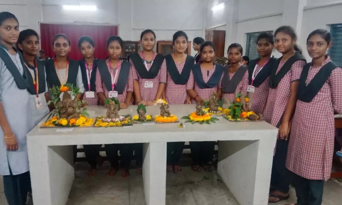 Students of the Botany Department of SKR Government Women’s College with clay Ganesh idols