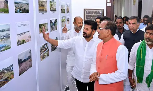Union Agricultural Minister Shivraj Singh Chouhan and Telangana Chief Minister A Revanth Reddy discuss the damages caused due to floods, in Hyderabad on Friday