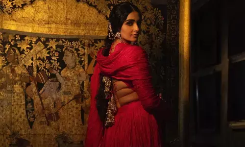 Sonam Kapoor goes vibrant in red as she blends traditions with style