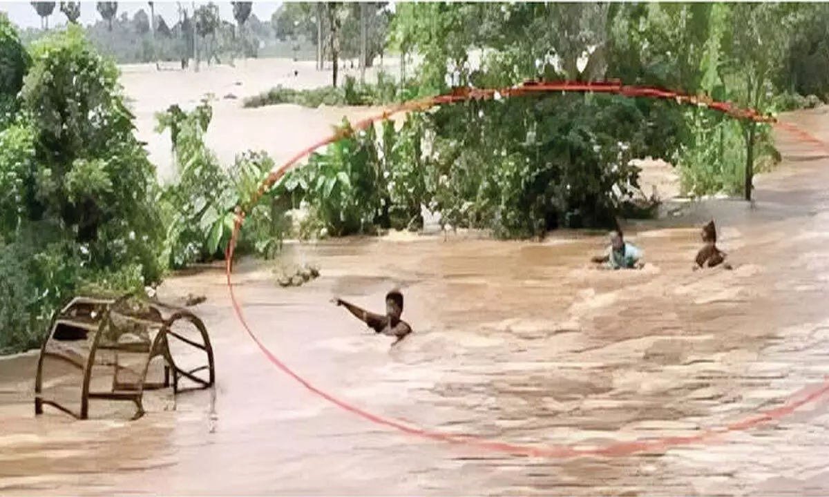 3 rescued after getting trapped in flood