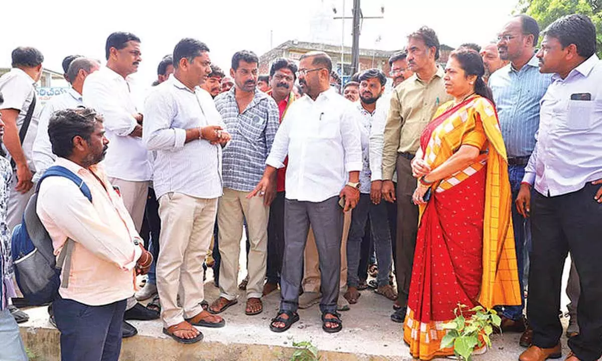 Warangal West MLA Naini Rajender Reddy and Mayor Gundu Sudharani speaking to the locals at Shayampet in Warangal  on Thursday