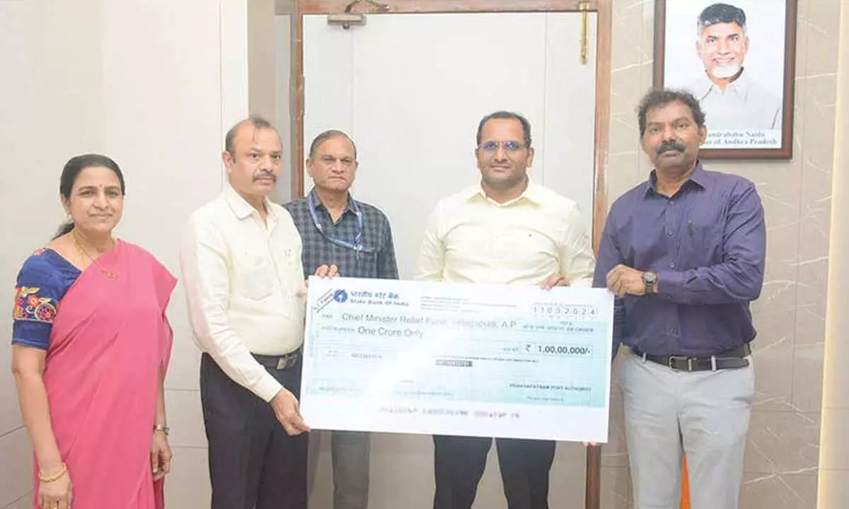 VPA officials handing over a cheque for Rs1 crore to district collector MN Harendhira Prasad for the AP Chief Minister’s Relief Fund in Visakhapatnam on Friday