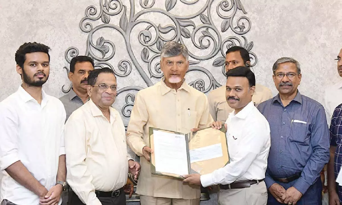 Pro Chancellor of SRM-AP Dr Satyanarayanan, Executive director (Research) Dr D Narayana Rao and others presenting a cheque for Rs 3 crore to Chief Minister N Chandrababu Naidu at the Secretariat at Velgapudi on Friday