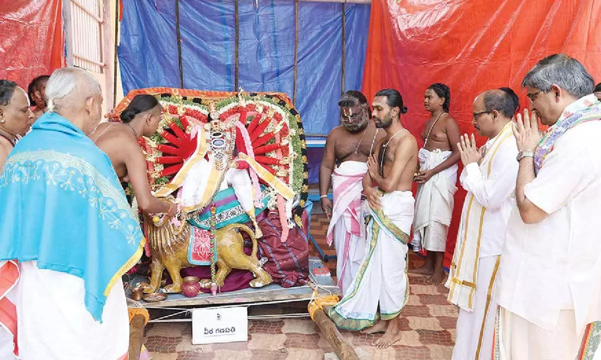 Former TTD EO LV Subrahmanyam participating in Ganesha Navahnikam celebrations held at  Dharmagiri Veda Vignana Peetham at Tirumala on Friday. Additional EO Ch Venkaiah  Chowdhary is also seen.