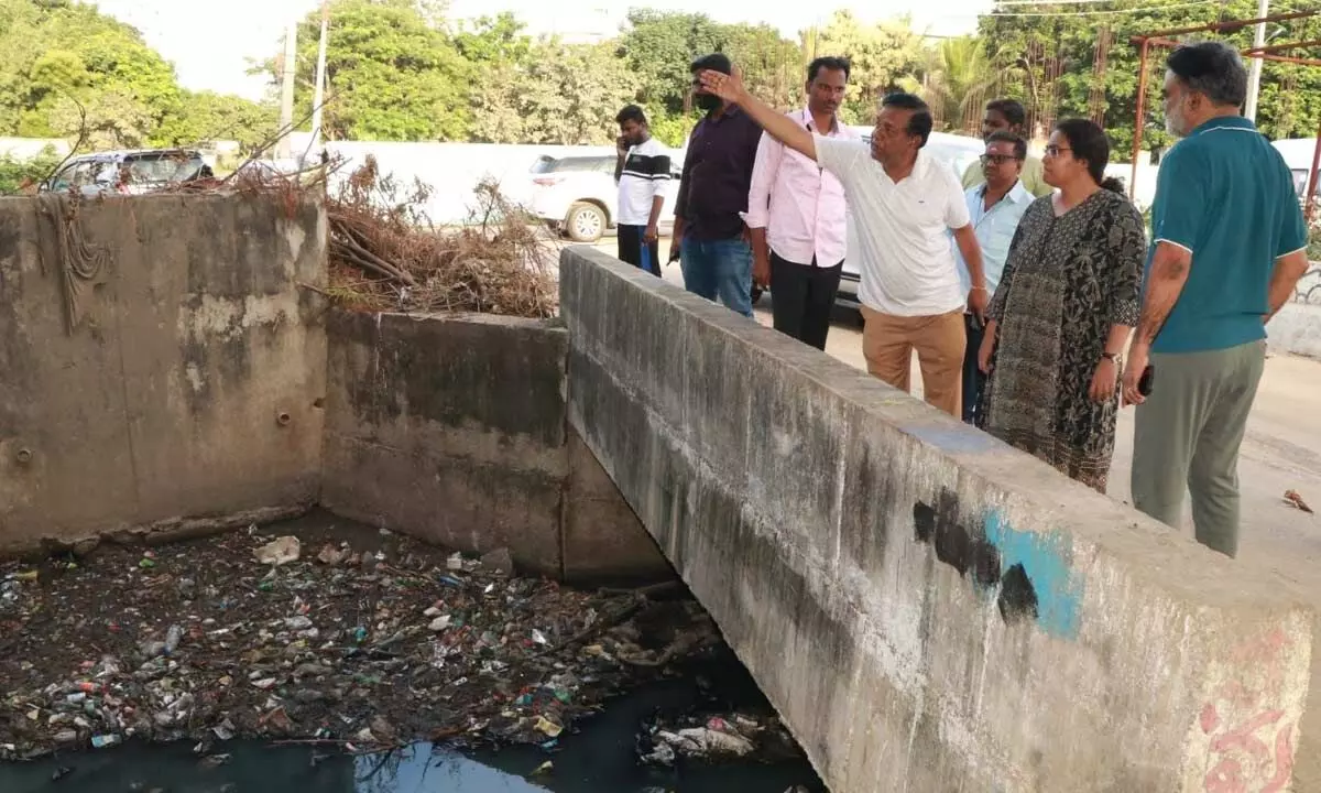 Municipal Corporation Commission Narapureddy Mourya inspecting drains in Tirupati on Friday