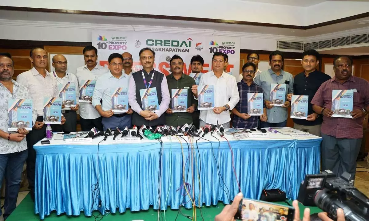 Representatives of CREDAI unveiling a brochure in Visakhapatnam on Saturday