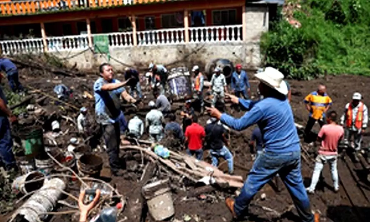 Mexico: 1 killed, 12 missing in landslide