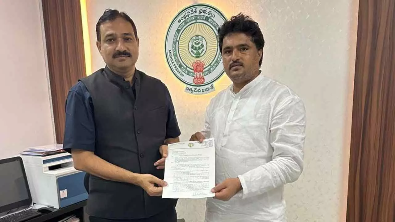 Vadithya Soma Sankar Naik, member of AP State Commission for SCs and STs submitting a memorandum to Principal Secretary Mukesh Kumar at the Secretariat in Amaravati on Tuesday