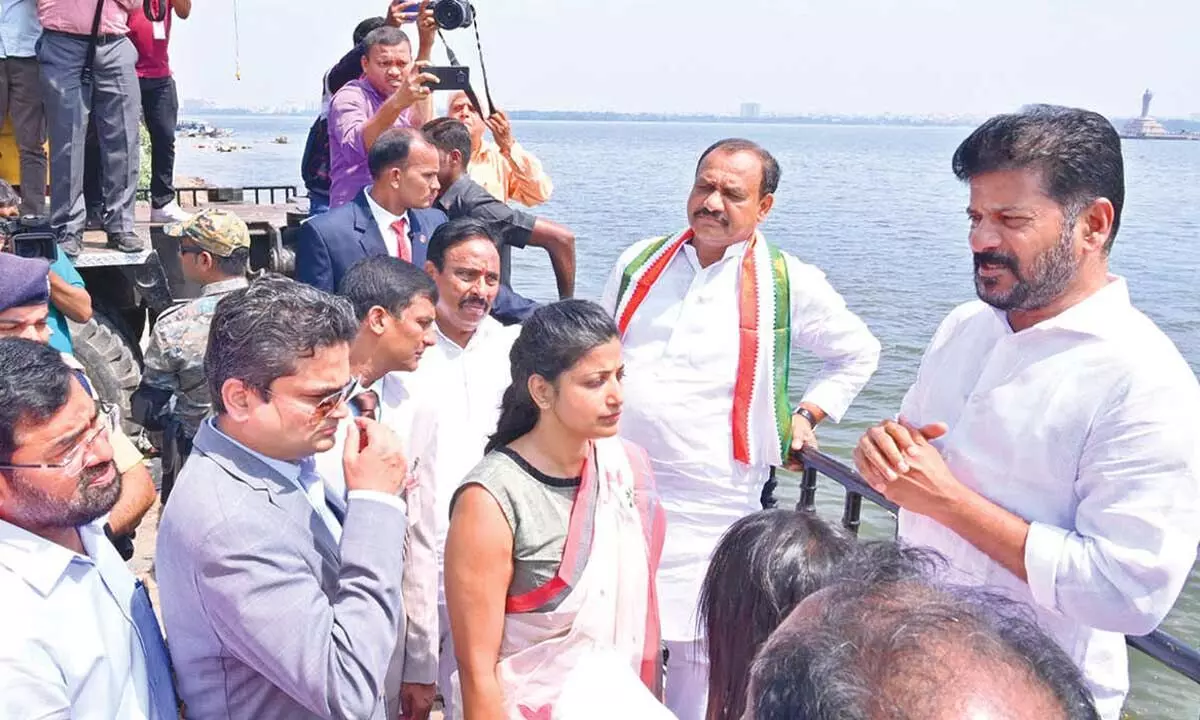 CM Revanth Reddy witnesses Bada Ganesh immersion