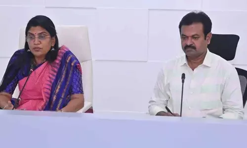 Collector Prasanthi and LDM DV Prasad participating in the District Special Consultative Committee meeting on Tuesday