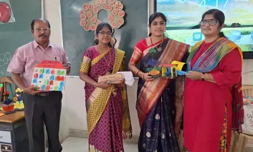 Rajahmundry Urban MEO-2 Rama Rajani honouring teachers for creating teaching and learning materials in the school complex meeting on Tuesday
