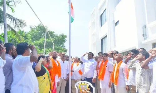 MLA Aleti unfurls national flag