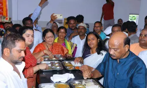Assembly Speaker Chintakayala Ayyanna Patrudu and District Collector Vijaya Krishnan having lunch at Anna Canteen in Anakapalli district on Wednesday.