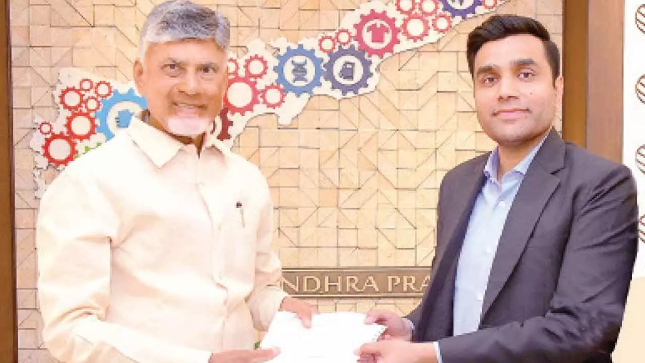 Managing director of Adani Ports and SEZ and son of Gautam Adani hands over cheque for Rs 25 crore to Chief Minister N Chandrababu Naidu towards CM Relief Fund in Amaravati on Thursday