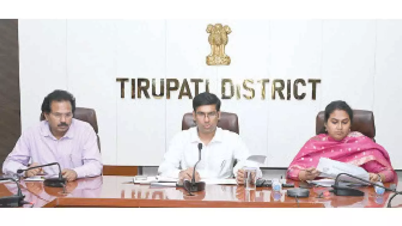 District Collector Dr S Venkateswar speaking at a review meeting on Swarnandhra @ 2047 in  Tirupati on Thursday. Corporation Commission N Mourya and DRO K Penchala Kishore are also seen.