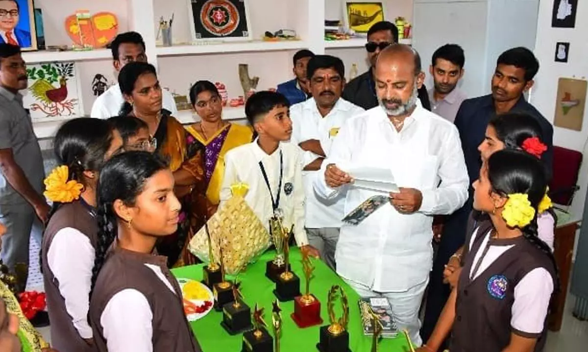 Union Minister Bandi Sanjay Kumar interacting with students at Ekalavya Model Residential School at Marimadla in Konaraopet mandal in Sircilla district