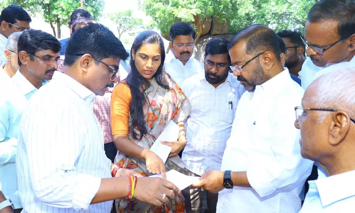 Warangal West MLA Naini Rajender Reddy and Hanumakonda district collector P Pravinya look at the Regional Science Centre’s development proposals in Hanumakonda on Thursday