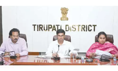 District Collector Dr S Venkateswar speaking at a review meeting on Swarnandhra @ 2047 in  Tirupati on Thursday. Corporation Commission N Mourya and DRO K Penchala Kishore are also seen.