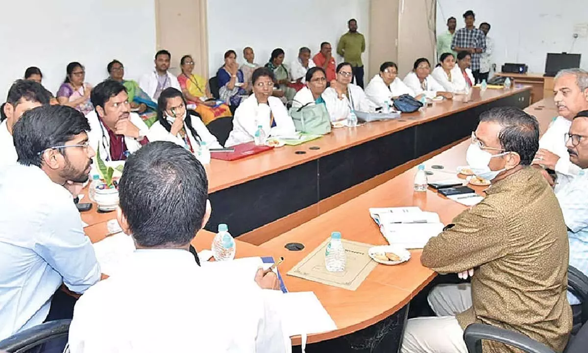 District Collector O Anand at a meeting with doctors and officials at Government General Hospital in Nellore on Friday