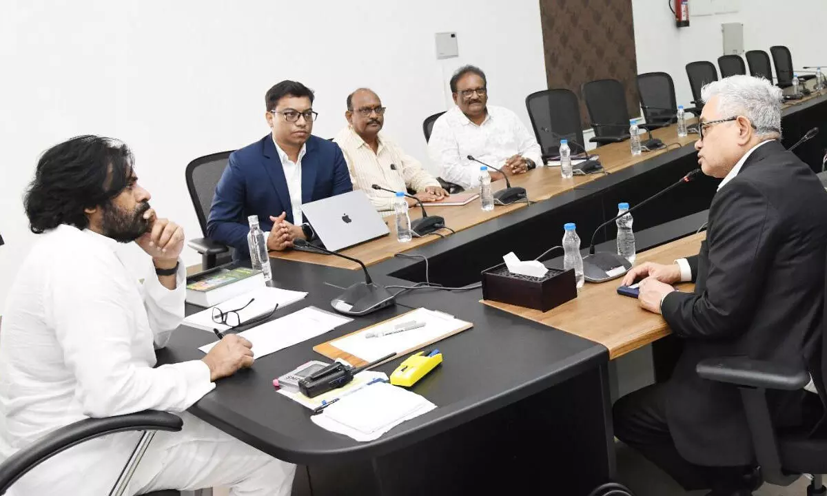 Deputy Chief Minister Pawan Kalyan holds a review with the officials of Asian Infrastructure Investment Bank and panchayat raj and rural development at the Secretariat in Amaravati on Friday