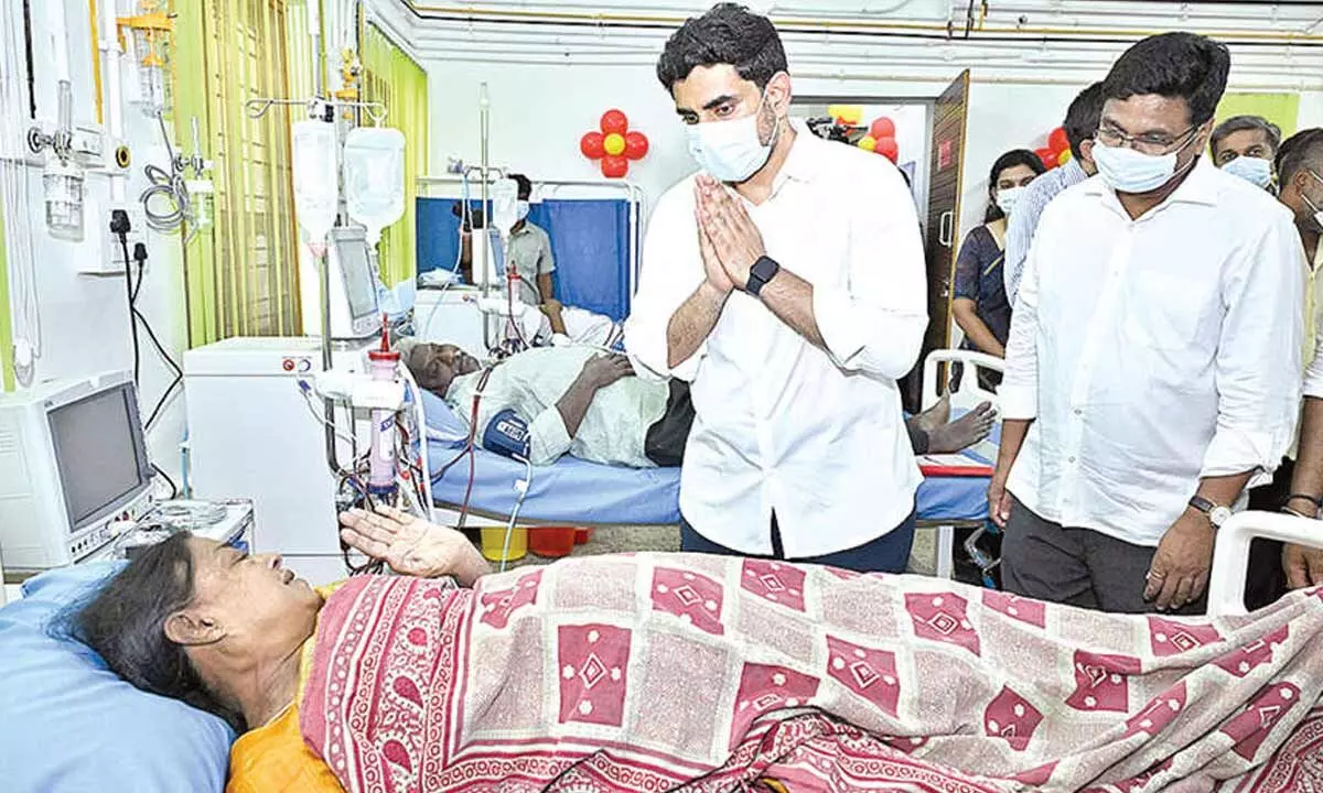 Minister Nara Lokesh interacting with a dialysis patient at  Bangarupalem hospital on Friday